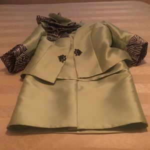 A three-piece light green suit